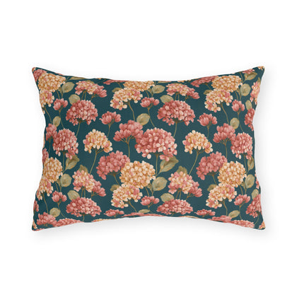 Pink and cream hydrangeas on deep teal outdoor lumbar pillow