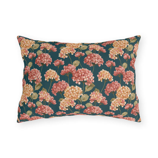 Pink and cream hydrangeas on deep teal outdoor lumbar pillow