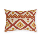 Rust Moroccan kilim outdoor lumbar pillow with stepped diamonds in rust, cream and mustard