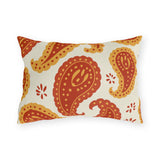 Boho outdoor lumbar pillow with large rust and mustard paisleys and small flowers on cream