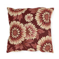 Cream and blush chrysanthemums on a deep oxblood outdoor pillow