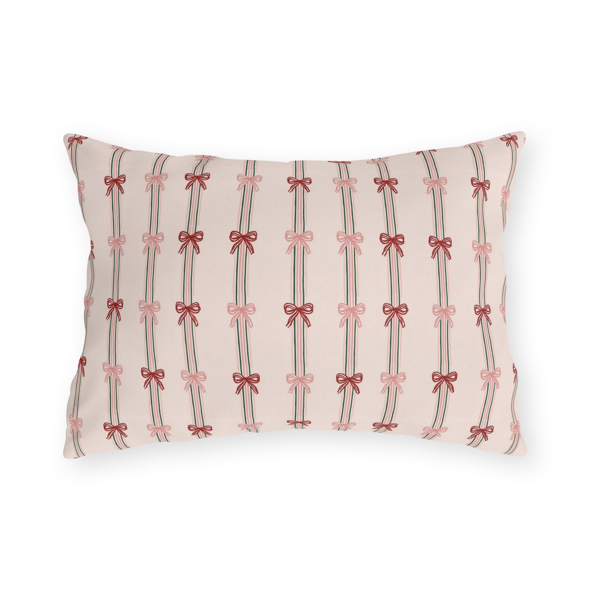 Pink and red ribbon bows on striped blush outdoor lumbar pillow