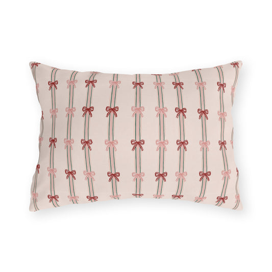 Pink and red ribbon bows on striped blush outdoor lumbar pillow