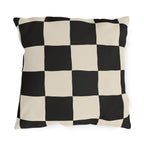 Black and cream checkerboard outdoor pillow with large hand-painted squares