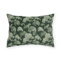 Sage and cream hydrangeas on dark forest green outdoor lumbar pillow