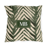 Personalized monogram on a green and cream chevron outdoor pillow