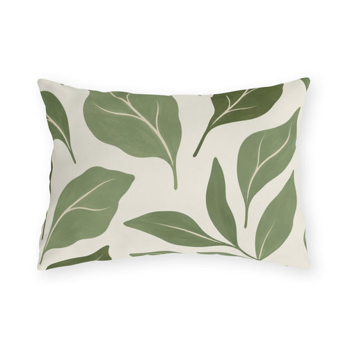 Sage green outdoor lumbar pillow with large abstract sage and olive leaves on off-white