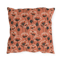 Coral poppies and black seed heads on terracotta outdoor pillow
