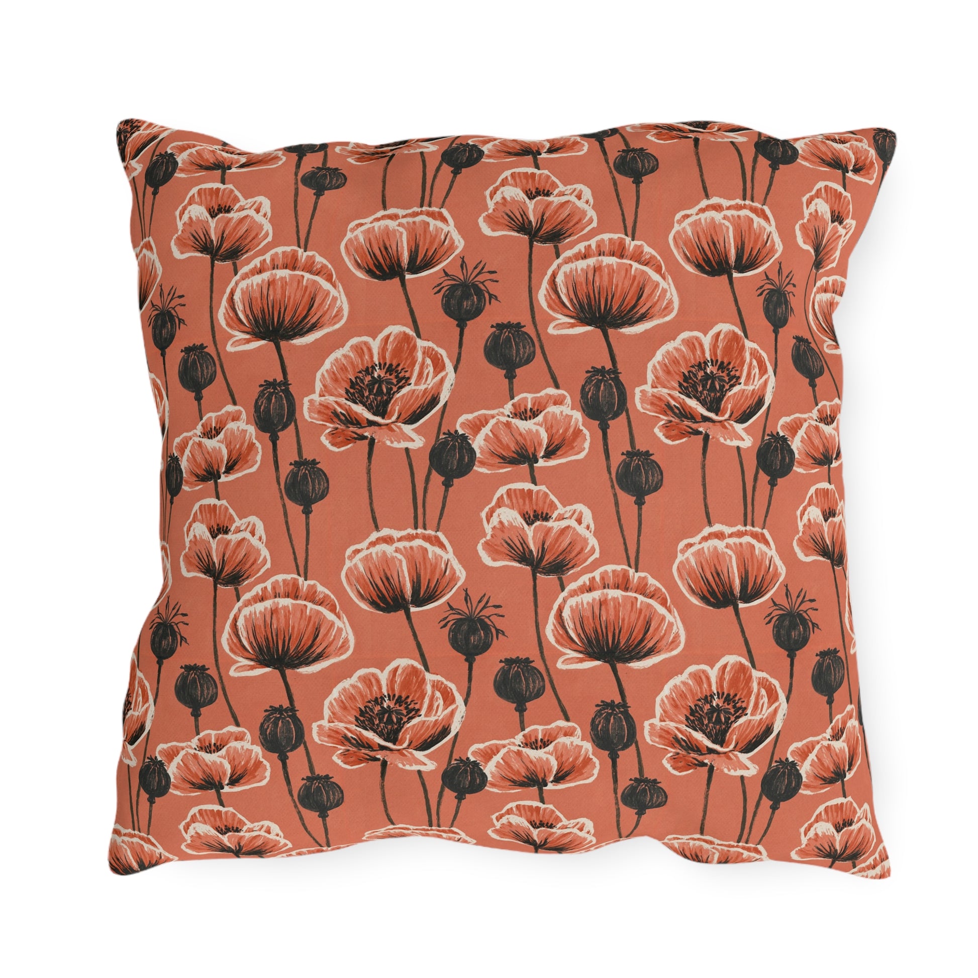 Coral poppies and black seed heads on terracotta outdoor pillow