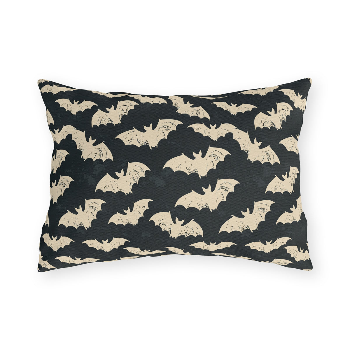 Bone white bats on a charcoal outdoor lumbar pillow, worn block print Halloween pattern