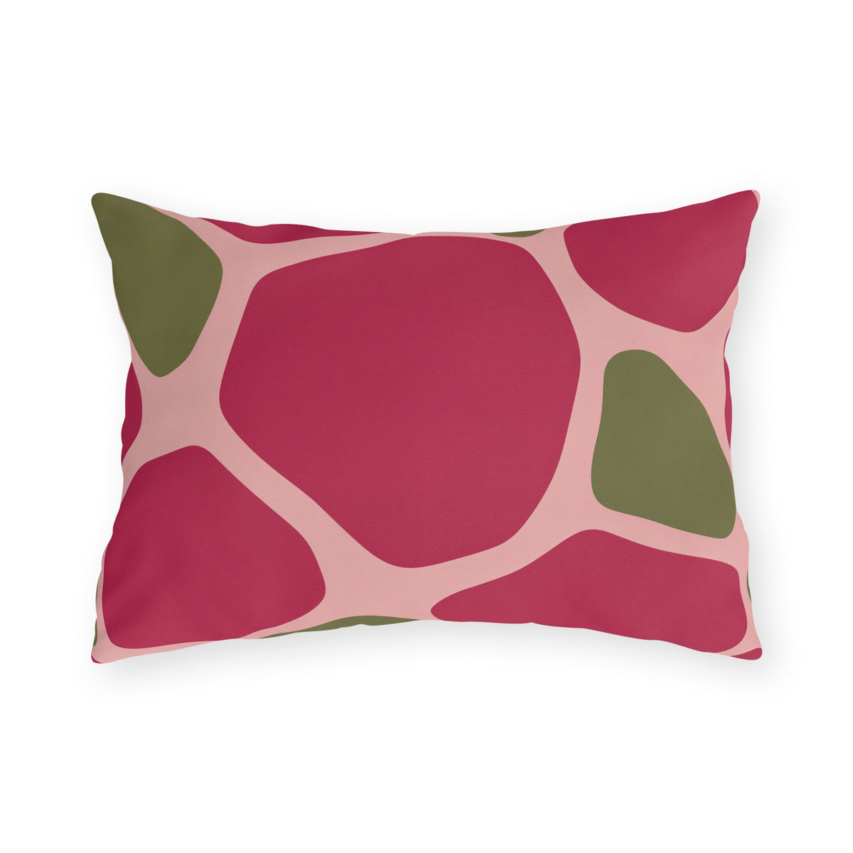 Modern outdoor lumbar pillow with large raspberry pink and olive green pebble shapes on blush