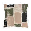 Olive, charcoal and clay brushed blocks on a cream outdoor pillow