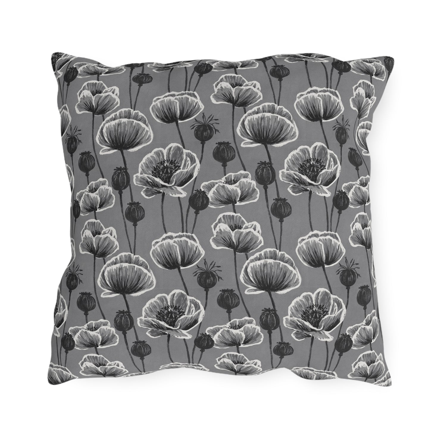 White and charcoal poppies and seed heads on grey outdoor pillow