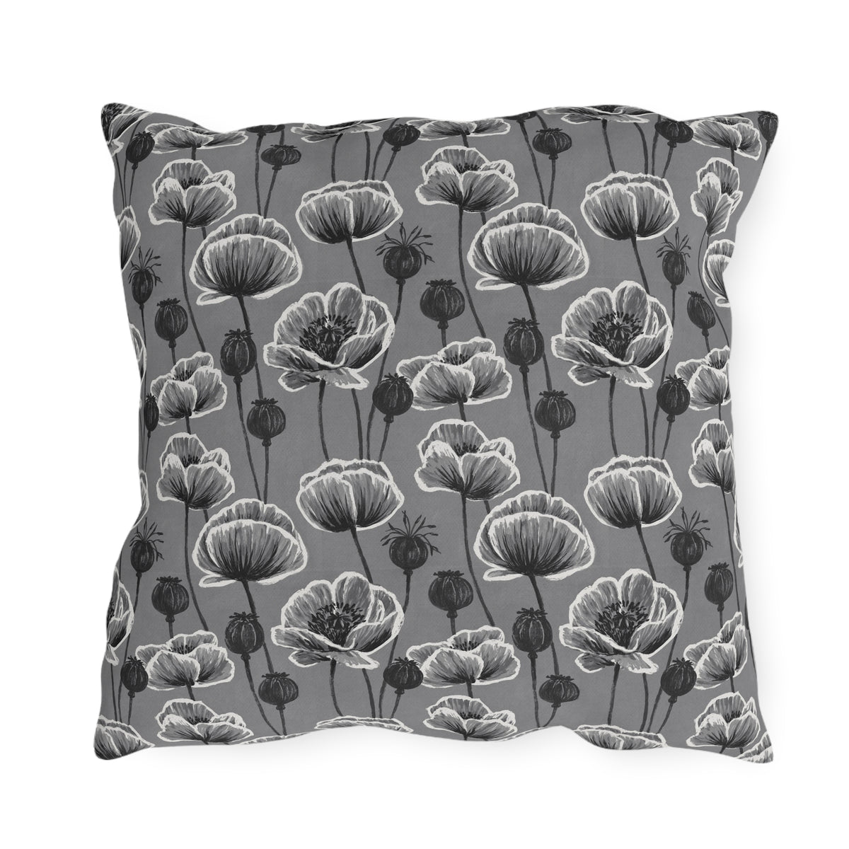 White and charcoal poppies and seed heads on grey outdoor pillow
