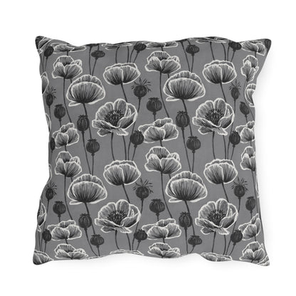 White and charcoal poppies and seed heads on grey outdoor pillow