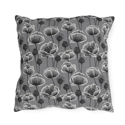 White and charcoal poppies and seed heads on grey outdoor pillow