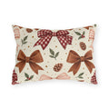 Christmas outdoor lumbar pillow with watercolor brown satin bows, red gingham bow, pinecones and holly on cream