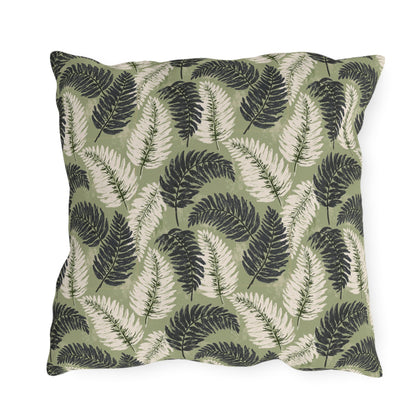Navy and cream fern fronds on sage green outdoor pillow