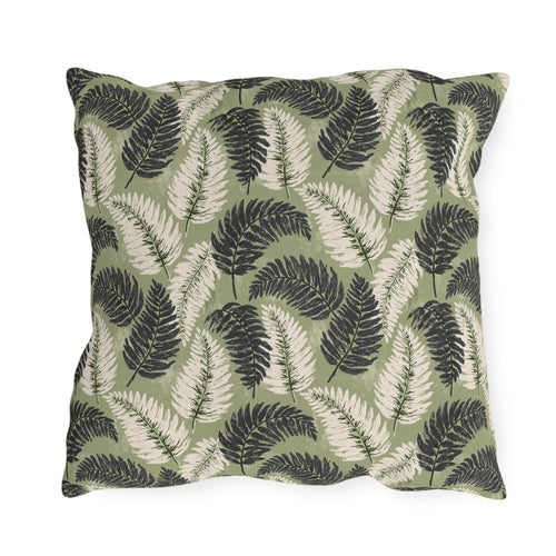 Navy and cream fern fronds on sage green outdoor pillow