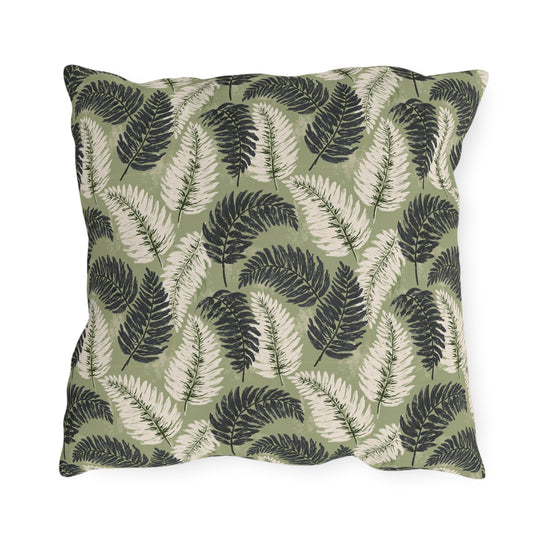 Navy and cream fern fronds on sage green outdoor pillow
