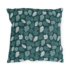 Teal, pine and white autumn leaves on dark teal outdoor pillow
