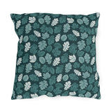 Teal, pine and white autumn leaves on dark teal outdoor pillow