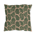 Dark green pine sprigs on blush peach outdoor pillow