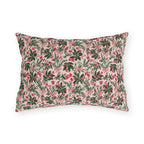 Holly, pine, red berries and pink bows on blush outdoor lumbar pillow