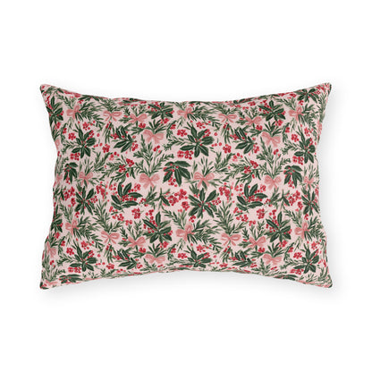 Holly, pine, red berries and pink bows on blush outdoor lumbar pillow