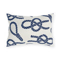 Nautical outdoor lumbar pillow with navy sailor rope knots, loops and coils on warm white