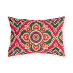 Boho outdoor lumbar pillow with Moroccan medallions in emerald green, orange and cream on raspberry pink