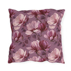Blush and burgundy painted magnolias on mauve outdoor pillow
