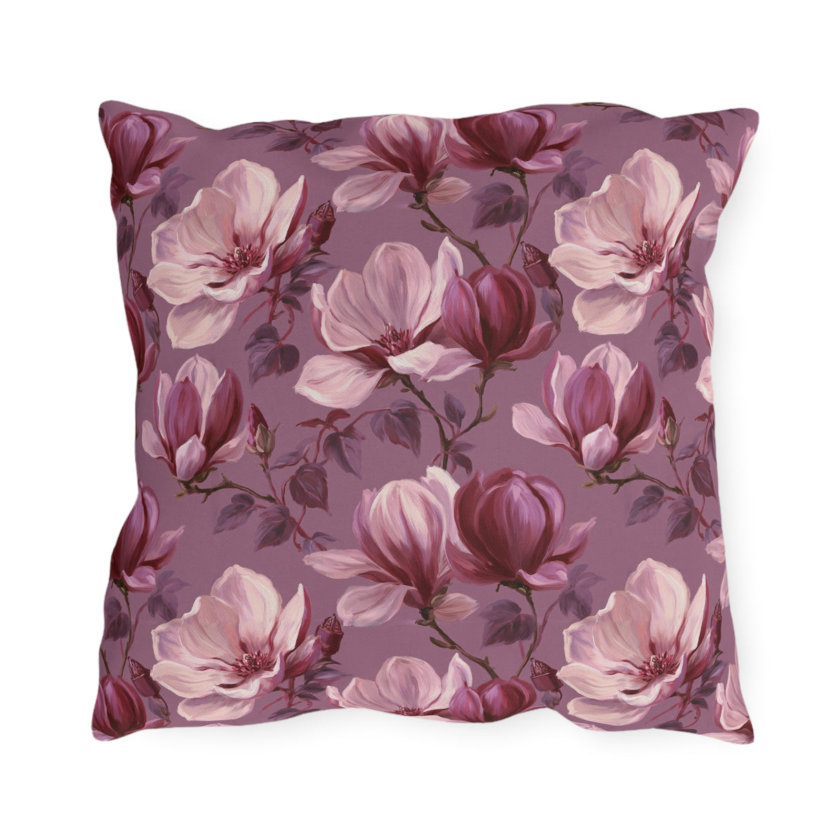 Blush and burgundy painted magnolias on mauve outdoor pillow
