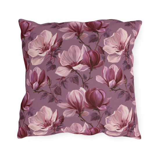Blush and burgundy painted magnolias on mauve outdoor pillow