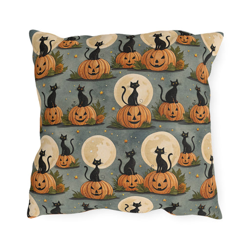 Black cats sitting on carved pumpkins under full moons on sage grey outdoor pillow