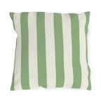 Sage green and cream cabana stripes on an outdoor pillow