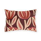 Oversized block print tulips in rose and cream on a deep oxblood outdoor lumbar pillow
