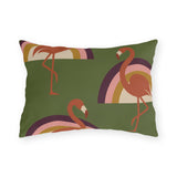 Retro flamingo outdoor lumbar pillow with orange flamingos and rainbow arcs on olive green