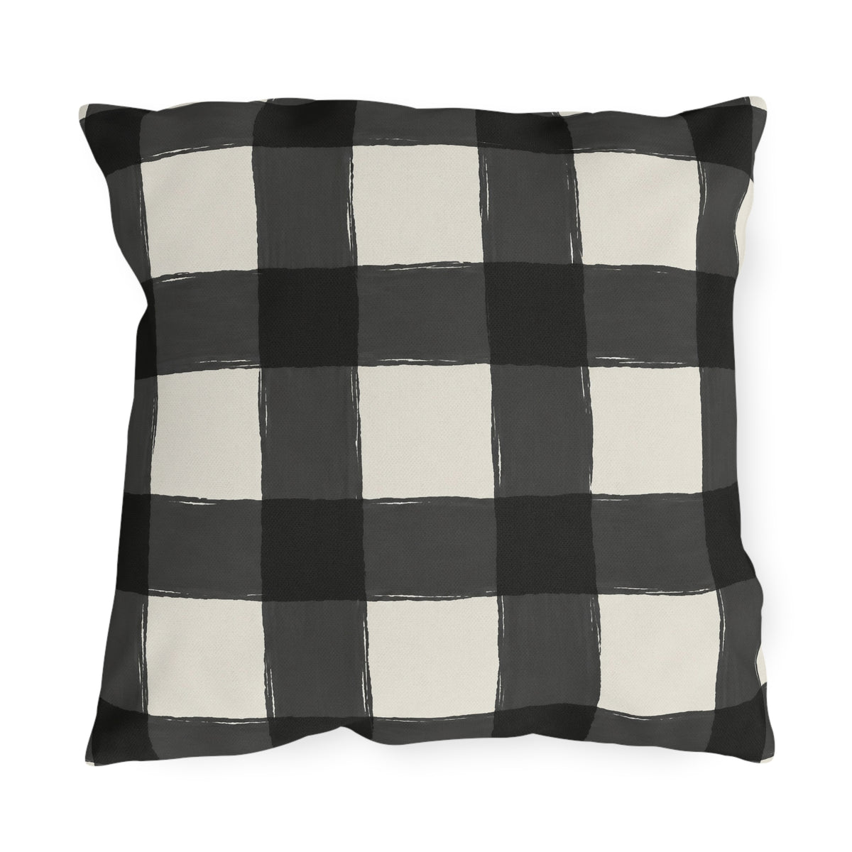Black and white gingham check outdoor pillow with hand-painted black and charcoal checks on off-white