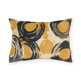 Navy brushed circles on a mustard yellow outdoor lumbar pillow