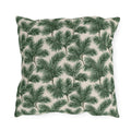 Deep green pine and fir branches on cream outdoor pillow