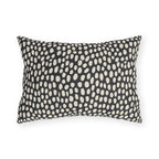 Hand-painted cream dots on charcoal outdoor lumbar pillow