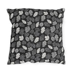 Charcoal, grey and white autumn leaves on black outdoor pillow