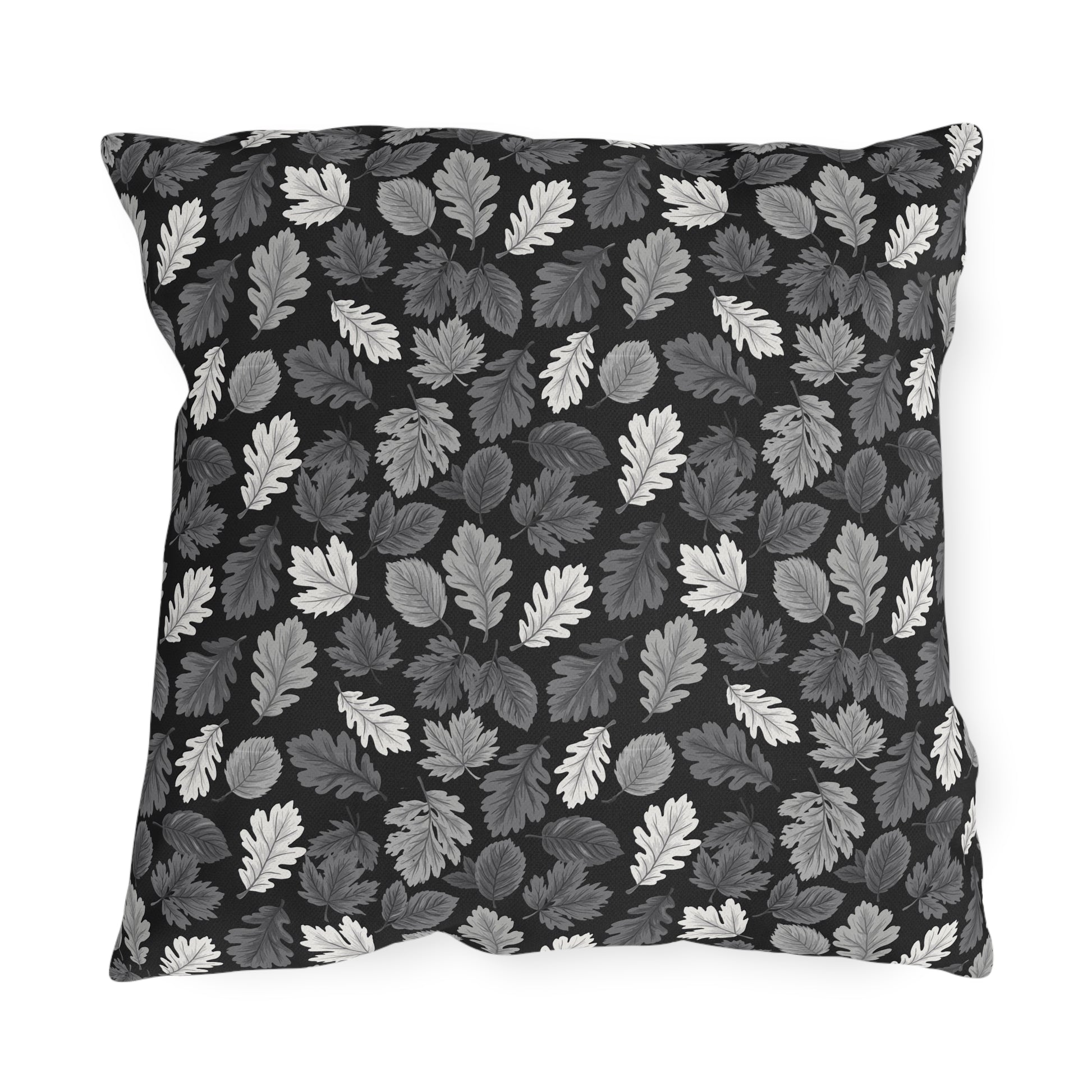 Charcoal, grey and white autumn leaves on black outdoor pillow