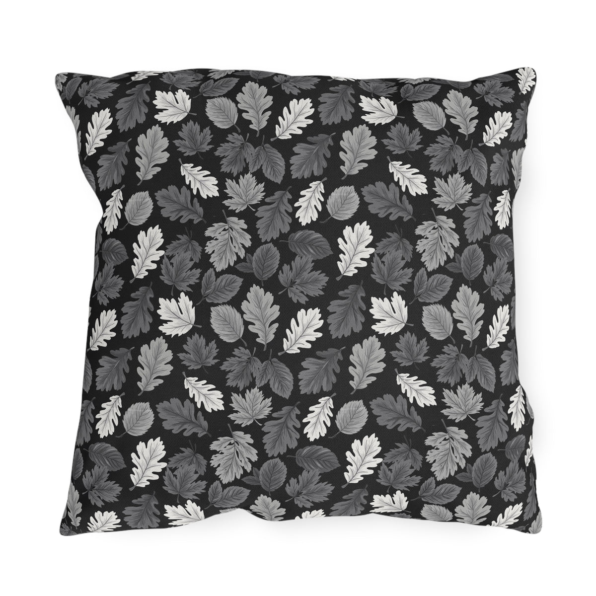 Charcoal, grey and white autumn leaves on black outdoor pillow