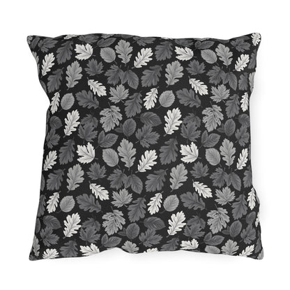 Charcoal, grey and white autumn leaves on black outdoor pillow