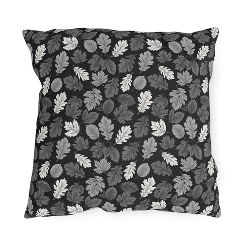Charcoal, grey and white autumn leaves on black outdoor pillow