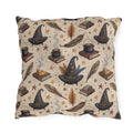 Witch hats, cauldrons, spell books and gold stars on parchment cream outdoor pillow