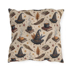 Witch hats, cauldrons, spell books and gold stars on parchment cream outdoor pillow