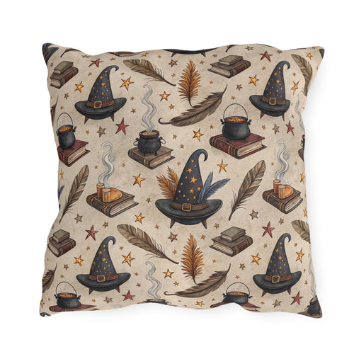 Witch hats, cauldrons, spell books and gold stars on parchment cream outdoor pillow